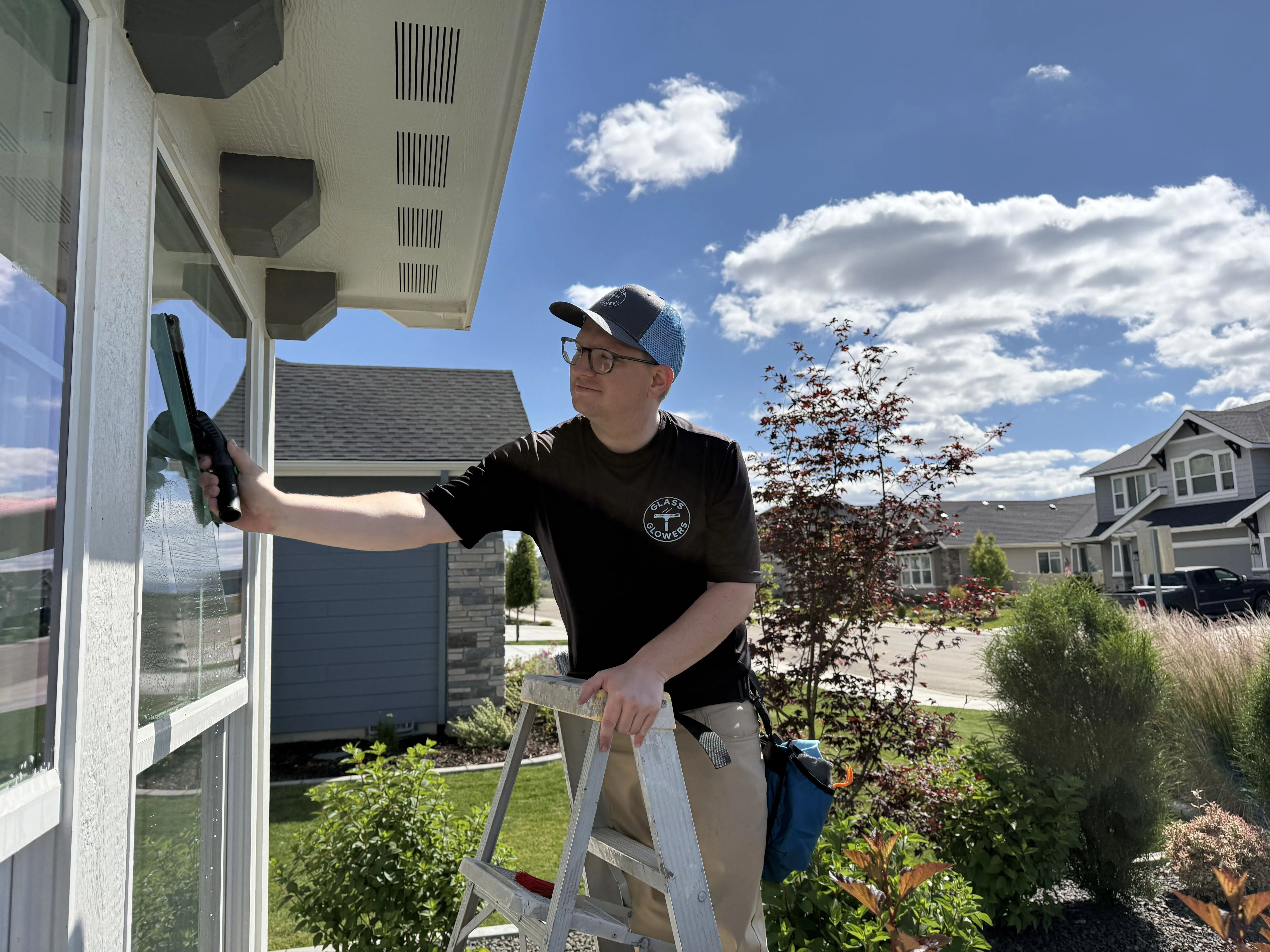 Residential exterior window cleaning on a modern home